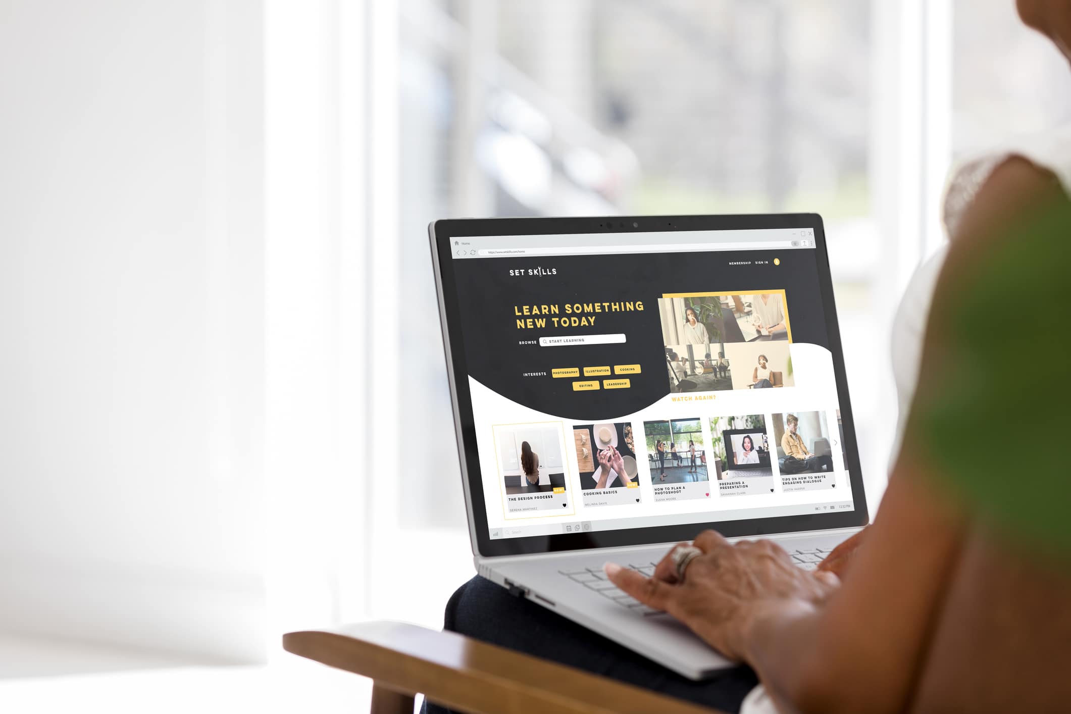 Woman browsing a skills website.